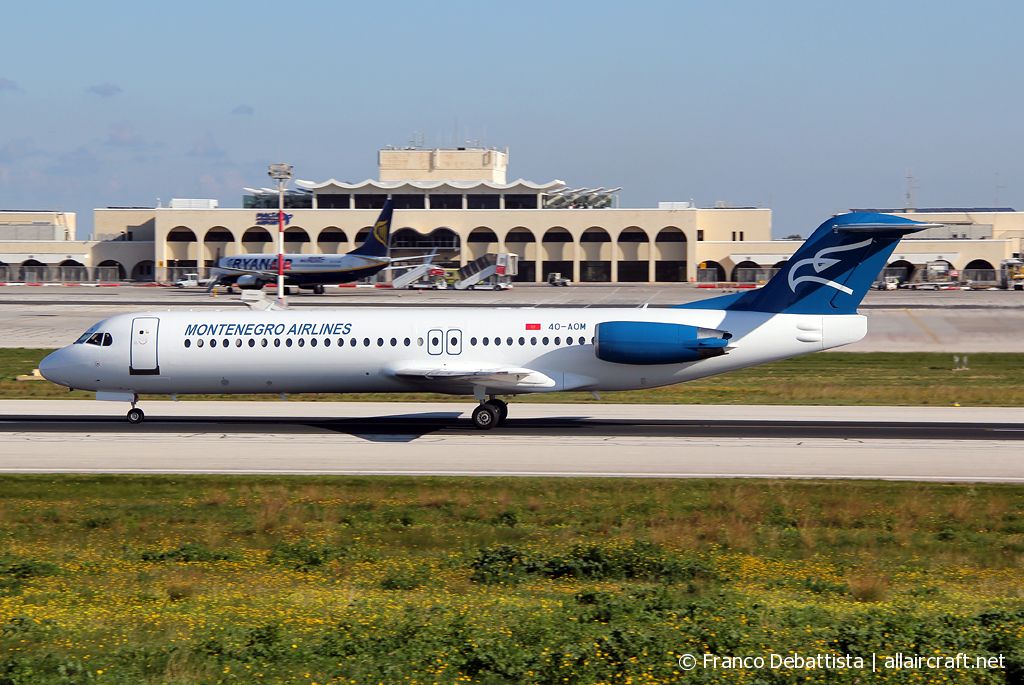 4O-AOM · Fokker F100 · (MLA / LMML)