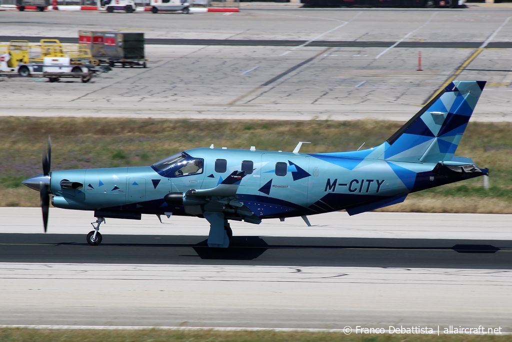 M-CITY · Daher TBM 960 · (MLA / LMML)