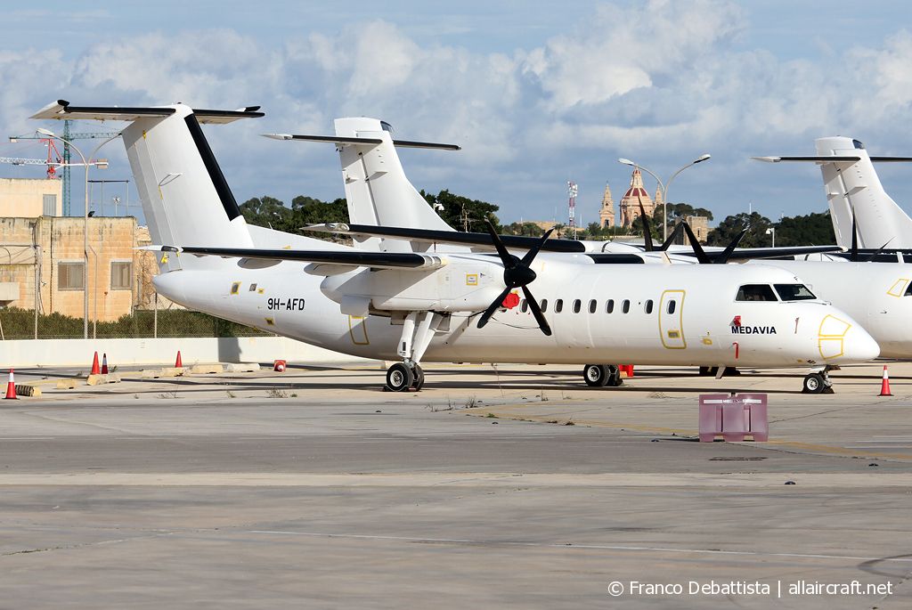 9H-AFD (458) 1997 Bombardier Dash 8-Q311