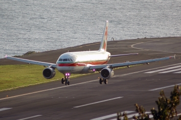 CS-TNE · Airbus A320-212 · (FNC / LPMA)