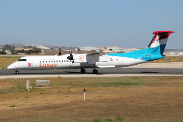 LX-LGE (4284) 2009 Bombardier Dash 8-Q402