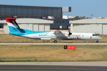 LX-LGE (4284) 2009 Bombardier Dash 8-Q402